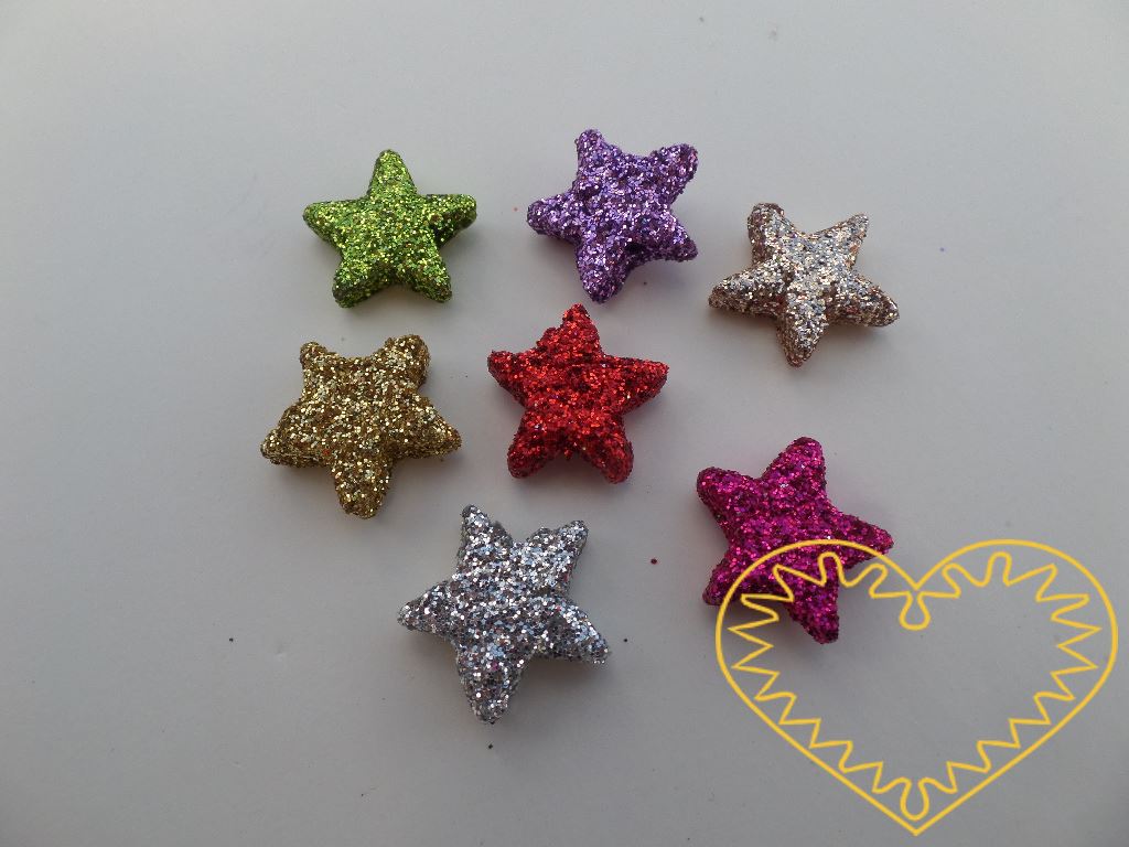Barevné mini hvězdičky Ø 2,5 cm- sada 144 ks. Jsou obalené metalickými glitry. Hodí se pro aranžování, výrobu dekorací či pro přípravu slavnostní tabule.